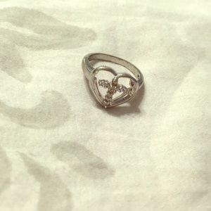 Diamond encrusted cross ring